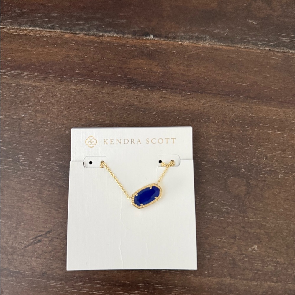 Kendra Scott Gold Necklace with Deep Blue Pendant